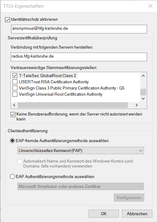 Screenshot of the TTLS Properties, of course in German: the aspect is even older than before, something like Windows 95 window. Well, it starts with a selected checkbox for activating the identity protection; after that, the text field has "anonymous@hfg-karlsruhe.de" written in it. The frame "Server Certificate Validation" has a text field for "Setting the connection with Server" and the answer is radius.hfg-karlsruhe.de. After that, the trusted Root Certification Authorities is a really long, scrollbar list with checkboxes: "T-TeleSec Global Root Class 2 is selected". After that, but outside the long list, a checkbox Don't prompt the user if unable to authorize the server is selected. That's all for the server certificate validation, but another frame "Client Authentication" is waiting for us. The radius field is selected in "Select non.EAP method for authentication" (and not Select an EAP method for authentication). In the dropdown menu, Unencrypted password (PAP) is selected. After this there is a checkbox, but with this configuration it can not be activated or deactivated. In EAP method for authentication, remember is the one not selected, there is a dropdown menu and a button for properties, but both can not be changed. At the bottom of the window, you probably guess: an Ok and a Cancel button.